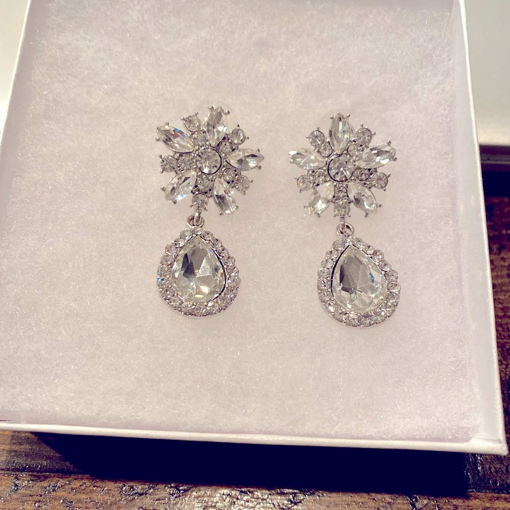 Earrings, worn as wedding jewelry.